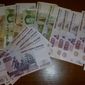 Курс доллара США растет к рублю на данных по добыче нефти в России