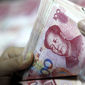 14 декабря Народный банк Китая вновь девальвировал юань