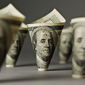 Курс доллара на Forex начинает торги недели с роста к мировым валютам
