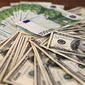 Курс доллара укрепляется к евро на Forex 