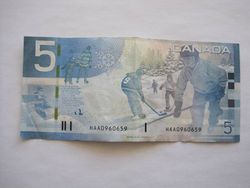Курс доллара к канадцу на Форекс снижается после отчета Reuters по рынку жилья в Канаде