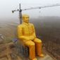 Гигантскую золотую статую Мао Цзэдуна решили снести