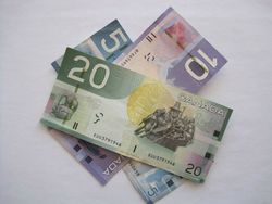 Курс доллара к канадцу остается в повышательном тренде на снижении цен производителей в Канаде