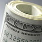 Курс доллара понизился к канадцу до 1,1127 после выхода статистики Канады 