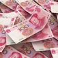 Банк Китая мощно понизил курс юаня