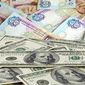 Курс гривны к доллару может упасть еще на 11% на Форексе