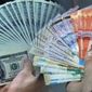 Снижение курса тенге к доллару не отразится на наших гражданах – Назарбаев 