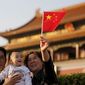 Китайский парламент разрешил семьям иметь двух детей