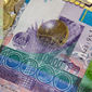 Курс тенге снизился к евро, швейцарскому франку и канадскому доллару 