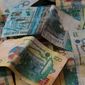 Курс тенге укрепился к иене и австралийскому доллару, но снизился к швейцарскому франку