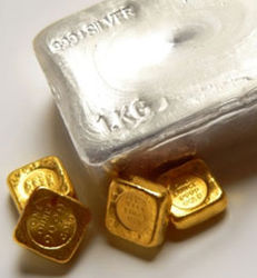 Инвесторам: возможно нисходящее движение на рынке золота и серебра