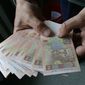 Девальвация гривны под чутким руководством НБУ продолжается 